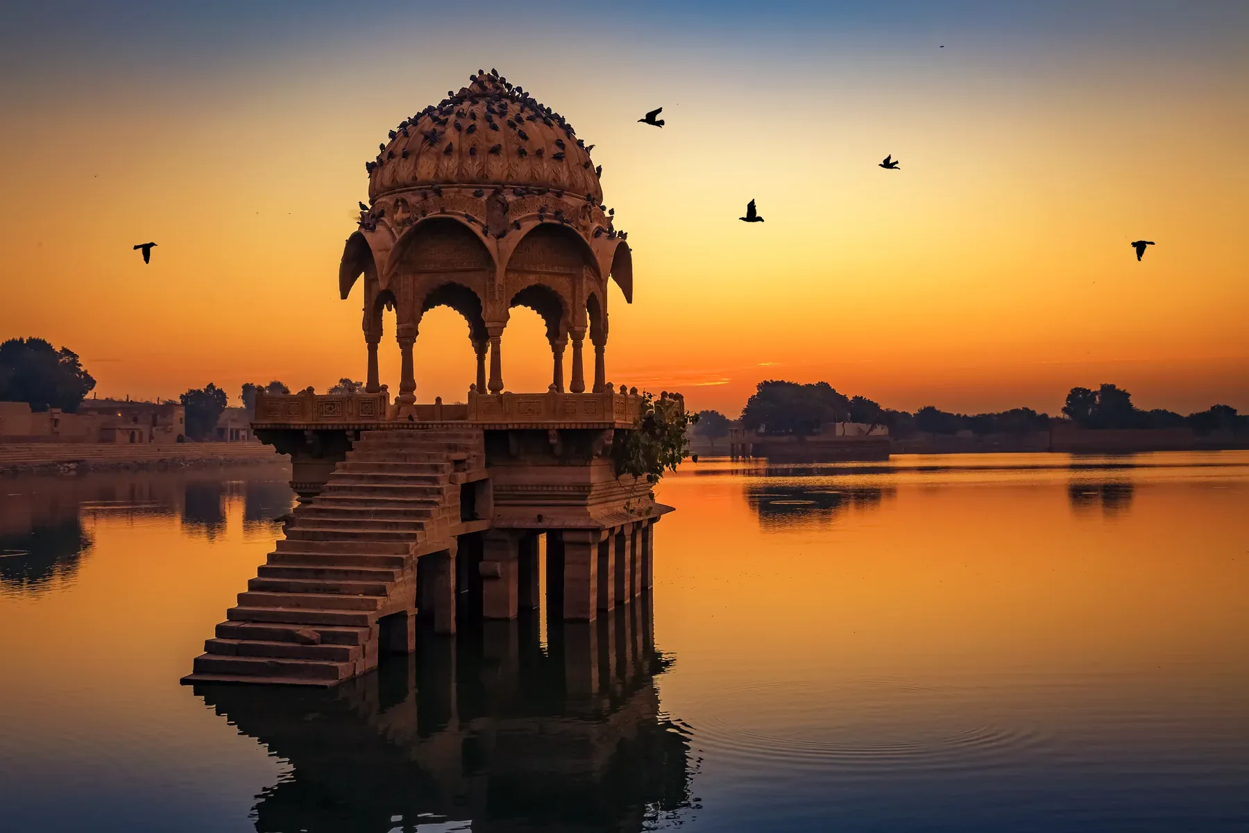 Gadi Sagar Lake and sandstone architecture in Jaisalmer