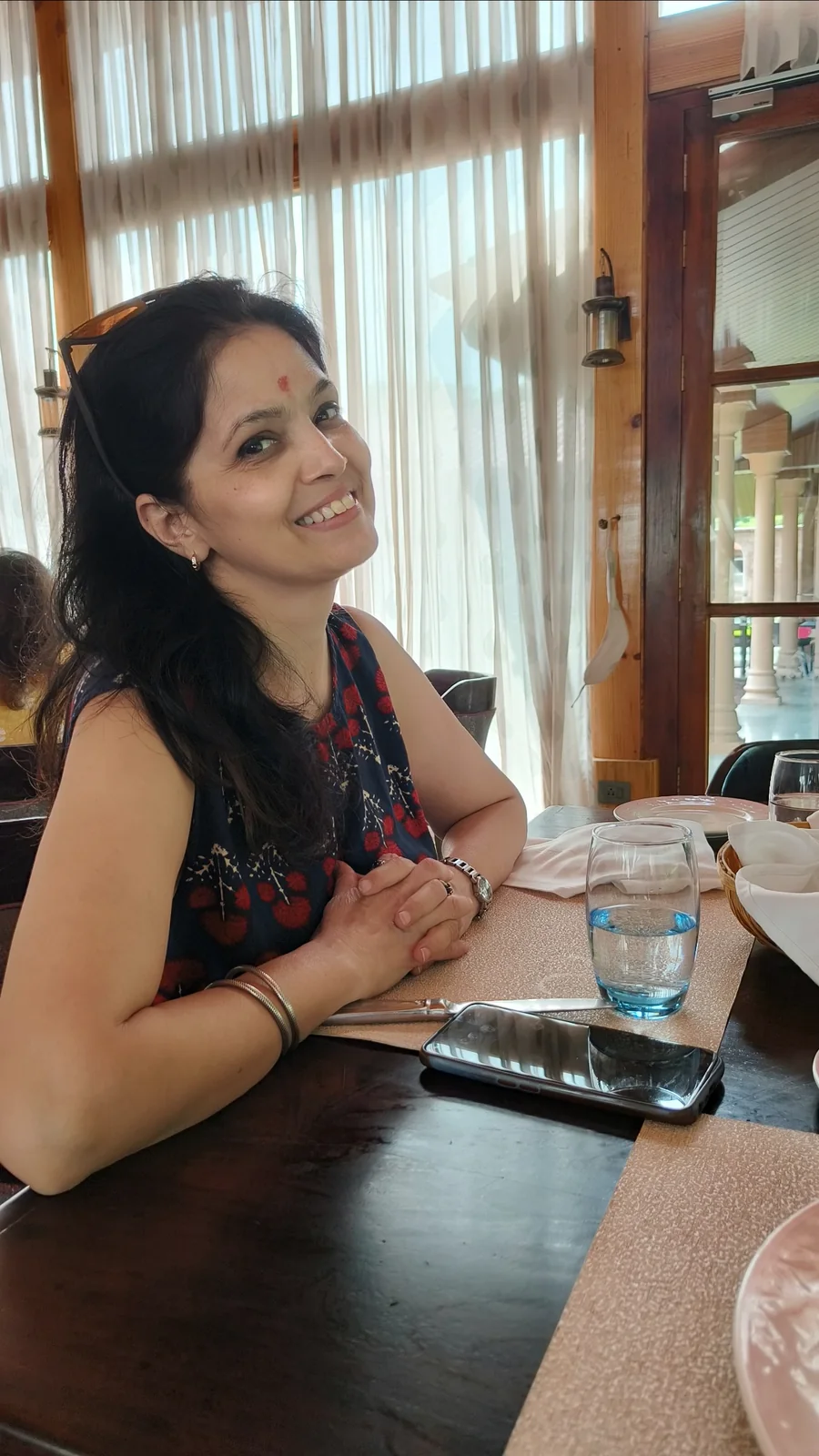 Neelima during a guest meal and conversation