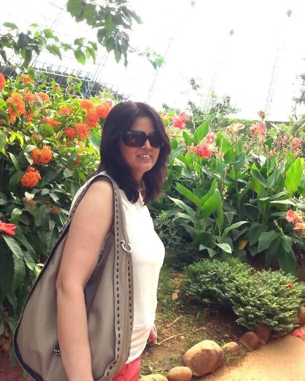 Neelima Jain in a flower garden